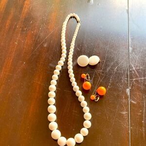 Vintage set of two white clip on earrings 28” bead necklace orange drop earrings